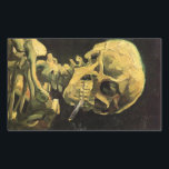 Adesivo Retangular Crânio com cigarro queimado por Vincent van Gogh<br><div class="desc">Crânio com Cigarro queimado por Vincent van Gogh é um apos impressionismo de arte de vintage que ainda pinta a vida. Um retrato do esqueleto humano fumando. Imagem do excelente a utilizar em produtos anti-tabagismo. Fumar matares 1.000 a cada ano, ajudar alguém a parar de fumar hoje. Imagem de excelente...</div>