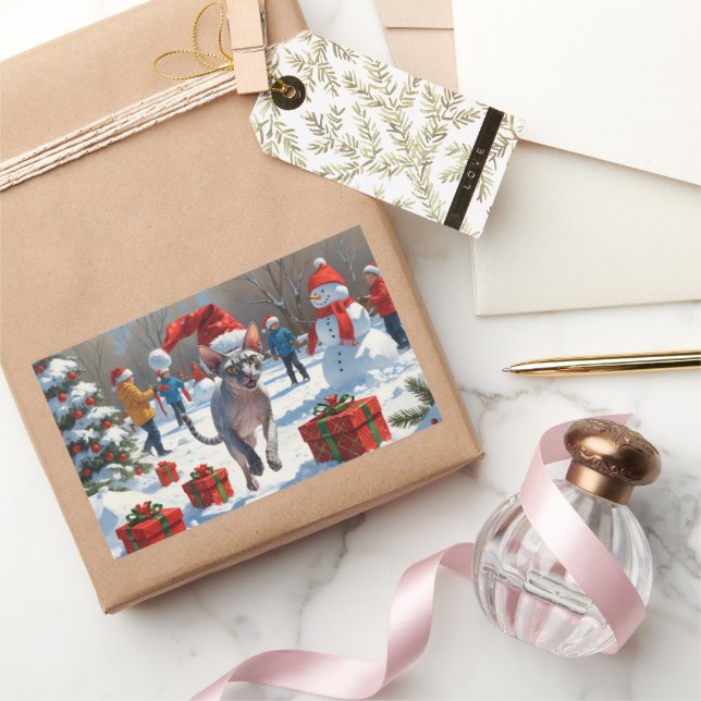 Adesivo Retangular Gato Sphynx correndo em neve com chapéu de Natal (Presentear)