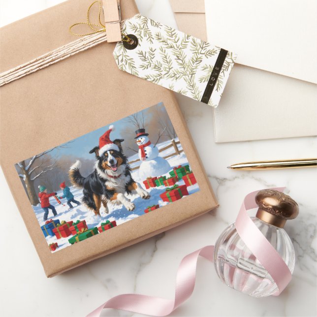 Adesivo Retangular Rough Collie Correndo na Neve com Chapéu de Natal (Presentear)