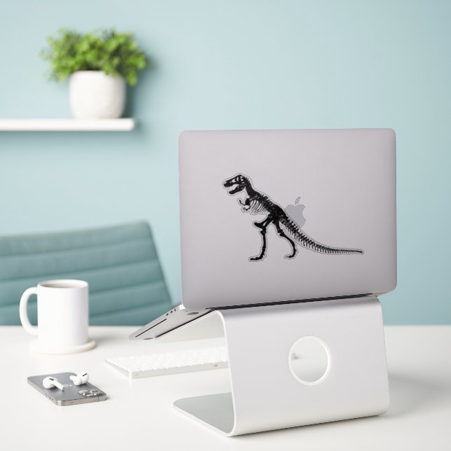 Adesivo Retro Whimsy: Clipart Funny Fóssil Dinossauro (Laptop na mesa)