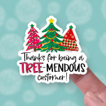 Adesivo Thanks for Being a Tremendous Customer Christmas<br><div class="desc">Adorn your small business packages this winter with a cute Christmas trees pun sticker! This fun and colorful scene of red and green Christmas trees shares a playful message, "Thank you for being a Tree-mendous customer!" Sure to brighten their day and get your business noticed - and appreciated! On this...</div>