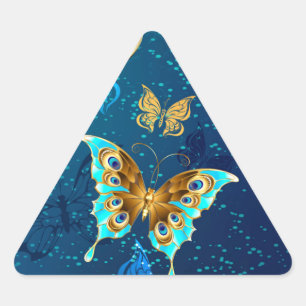 Adesivo Triangular Borboletas Douradas em um Fundo Azul
