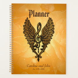 Agenda A alma da melodia, uma clave ouro com asas.