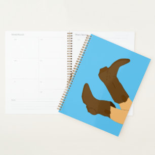 Agenda Botas de vaqueiro em fundo azul claro