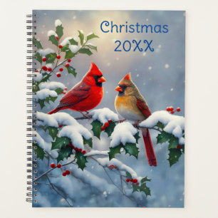 Agenda Cardeais vermelhos e Holly na neve