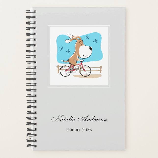 Agenda Cartoon Cute Dog Puppy Bicycle Riding Bike 2026 (Frente)