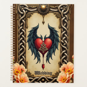 Agenda Elegância celta com um coração e asas. 