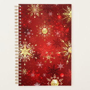 Agenda Flocos de neve do Ouro de Natal em Fundo Vermelho