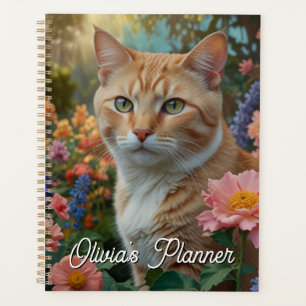 Agenda Gato laranja branco bonito em jardim floral