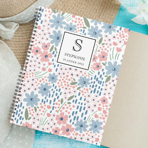 Agenda Monograma com padrão floral caprichoso rosa e azul