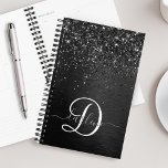 Agenda Monograma de brilho preto personalizado<br><div class="desc">Personalize facilmente esse design elegante planificador de tendências,  com brilho bonito preto cintilante em um fundo metálico escovado preto.</div>