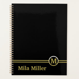 Agenda Monograma Dourado sobre fundo preto