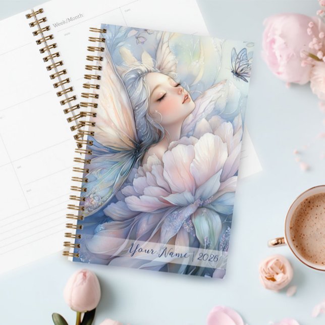 Agenda Peony Of The Dawn (Peony Of The Dawn Planner in a table next to a cup of cappuccino)