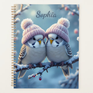 Agenda Periquitos fofos com gorros de pompom em um galho
