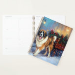 Agenda Santo Bernard Christmas Fesason Season<br><div class="desc">Prepare-se para celebrar o feriado com o nosso charmoso Design cênico de Natal do Cão! Este delicioso produto apresenta adoráveis companheiros caninos rodando em meio a uma terra maravilhosa do inverno, adornada com luzes cintilantes, holly, e ornamentos festivos. Seu coração derreterá enquanto você testemunha cachorros vestidos com chapéus de Papai...</div>