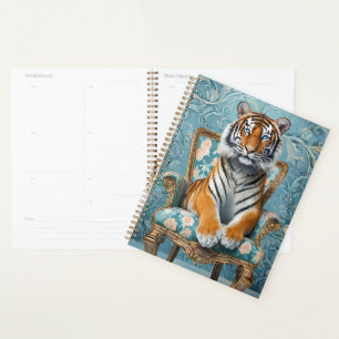 Agenda Tigre sentado numa cadeira de safra
