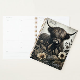 Agenda Touro de terras altas com girassol