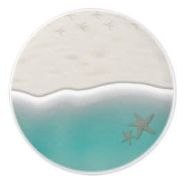 Água do mar da praia arenosa com peixe-estrela