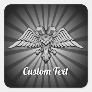 Águia cinza com dois adesivos de Cabeças