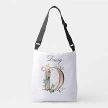Bolsa transversal com letra D floral em dourado el