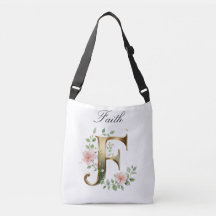 Bolsa transversal com letra F floral em dourado el