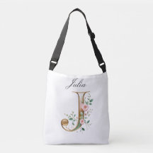 Bolsa transversal com letra J floral em dourado el