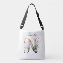 Bolsa transversal com letra N floral em dourado el
