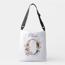 Bolsa transversal com letra O floral em dourado el