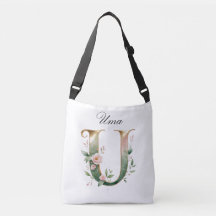 Bolsa transversal com letra U floral em dourado el
