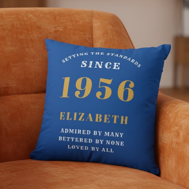 Almofada 70th Birthday 1956 Add Name Blue Gold Personalized (1956 Throw pillow on an orange chair.)