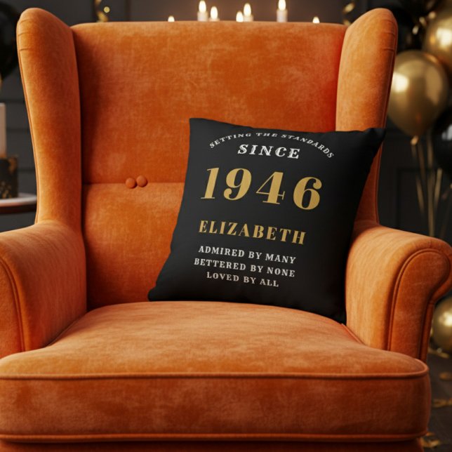 Almofada 80th Birthday Gift Personalized 1946 Black Gold (A vibrant orange velvet wingback armchair with a black throw pillow for an 80th birthday celebration)