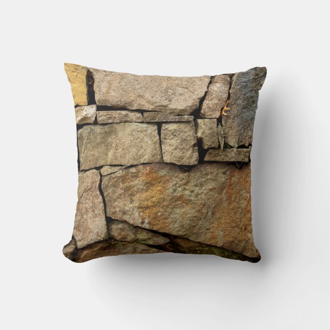 Almofada A stone wall made of cobblestones background textu (Frente)