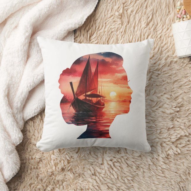 Almofada a woman's head enveloping a sunset with a sailboat (Cobertor)