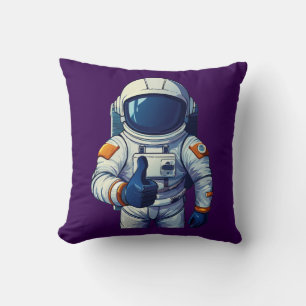 Almofada astronauta em traje espacial mostrando polegar par