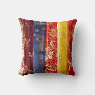 Almofada Azul vermelho dourado do teste padrão de seda