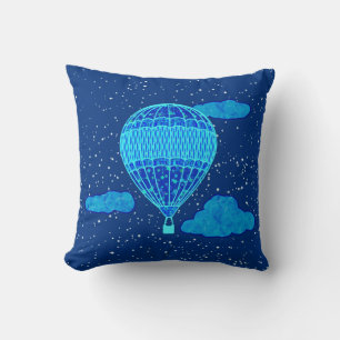 Almofada Balão de ar quente contra céu noturno em azul prof