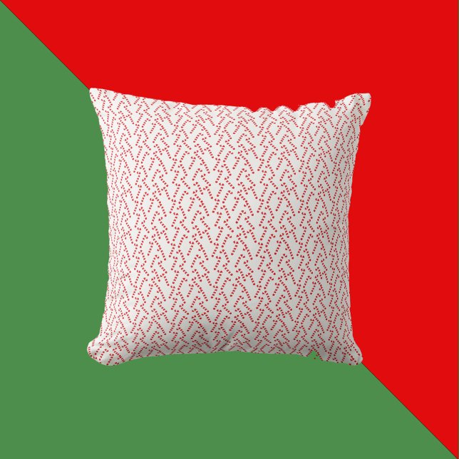 Almofada Candy Cane Padrão Vermelho e Branco (A throw pillow with a red and white candy cane Christmas pattern)