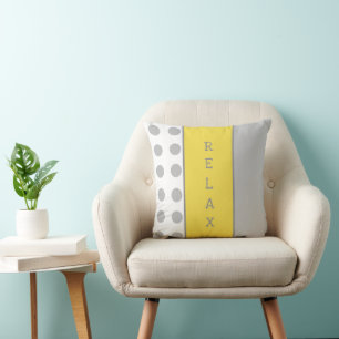 Almofada Cinza e amarelo com bolinhas e listras relaxam