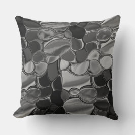 Almofada Cinzas claras e formas arredondadas escuras.