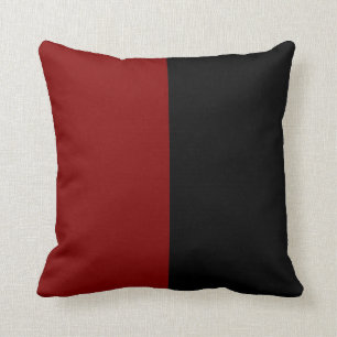 Almofada Cor de divisão de preto e marrom.