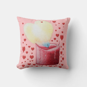 Almofada cor-de-rosa de velas vermelhas da chama em forma d