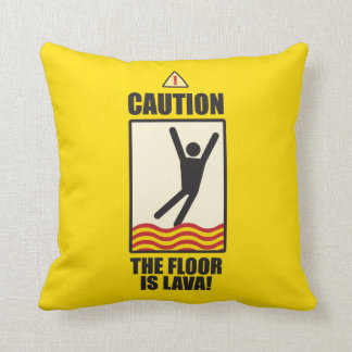 Almofada CUIDADO. O assoalho é lava. um travesseiro