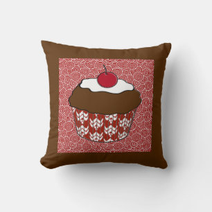 Almofada Cupcake do chocolate no teste padrão vermelho e