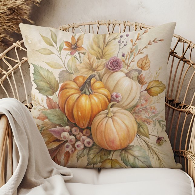 Almofada de lançamento de abóboras e frutas vermel (Cozy Fall Pumpkins and Berries Throw Pillow in a boho rattan armchair.)