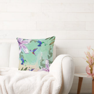 Almofada de lançamento de pássaros florais verdes.