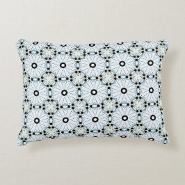 almofada decorativa com um padrão geométrico