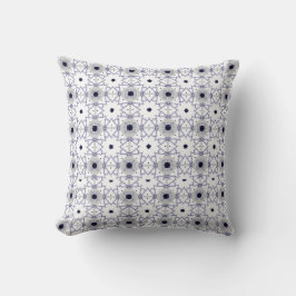 almofada decorativa com um padrão geométrico