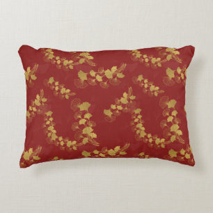 Almofada Decorativa Folhas Douradas de Gingko Balboa no fundo vermelho