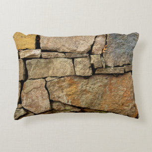 Almofada Decorativa Um muro de pedra feito de paralelepípedos textu de