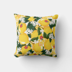 Almofada Design de limões amarelos tropicais.
